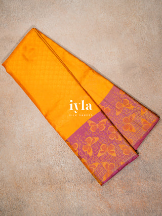 The Butterfly Weave Kanjeevaram in Bright Orange