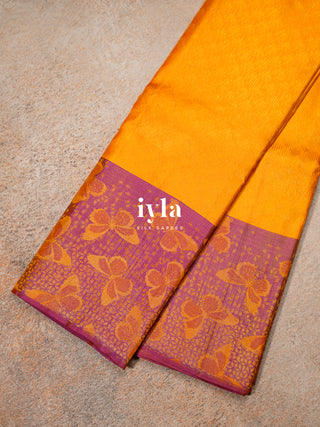 The Butterfly Weave Kanjeevaram in Bright Orange