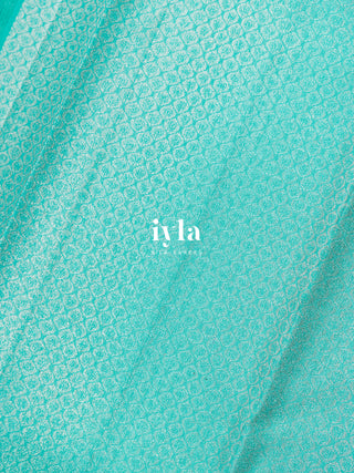 The Birds on Blooming Magnolia Silk Saree