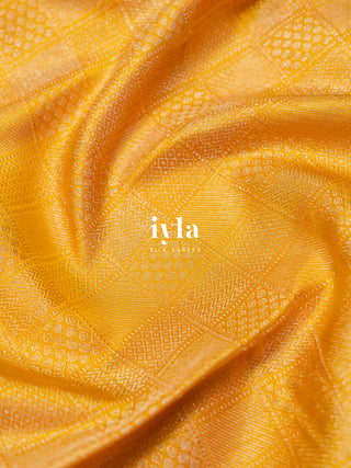 The Bridgerton Inspired Kanjeevaram in Amber Yellow