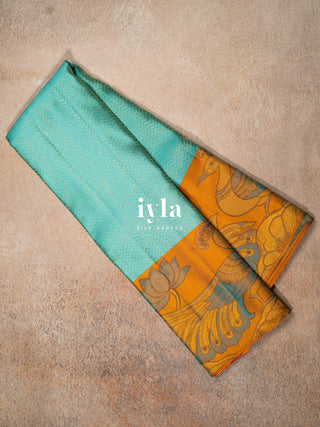 The Peacock Panache Kanjeevaram in Aqua Blue