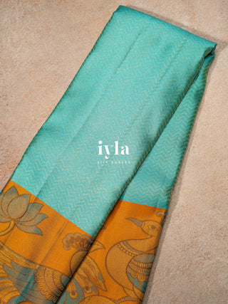 The Peacock Panache Kanjeevaram in Aqua Blue