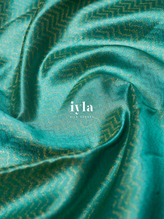 The Peacock Panache Kanjeevaram in Aqua Blue