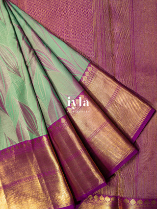 The Tropical Foliage Silk Saree in Turquoise Green