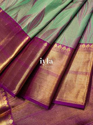 The Tropical Foliage Silk Saree in Turquoise Green