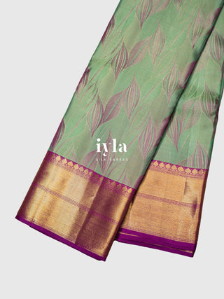 The Tropical Foliage Silk Saree in Turquoise Green