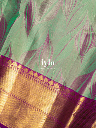 The Tropical Foliage Silk Saree in Turquoise Green