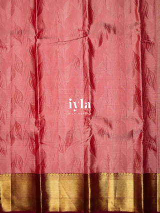 The Tropical Foliage silk saree in Powder Red