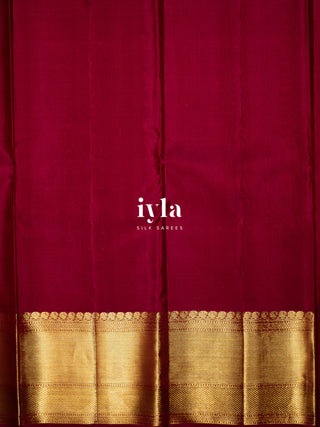 The Tropical Foliage silk saree in Powder Red