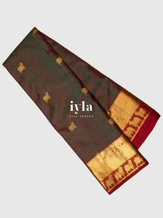 The Pichwai cows Kanjeevaram in Crimson Emerald Dual Tone