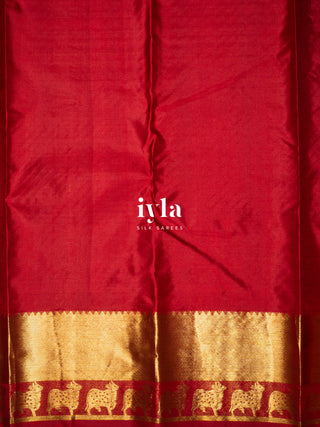 The Pichwai cows Kanjeevaram in Crimson Emerald Dual Tone