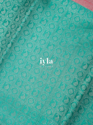 The Krishna Leela Kanjeevaram in Persian Green