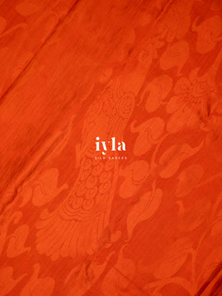 The Divine Drape of Radha Krishna in Burnt Orange
