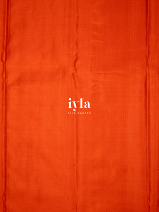 The Divine Drape of Radha Krishna in Burnt Orange