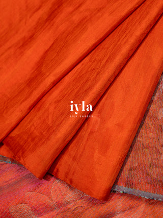 The Divine Drape of Radha Krishna in Burnt Orange