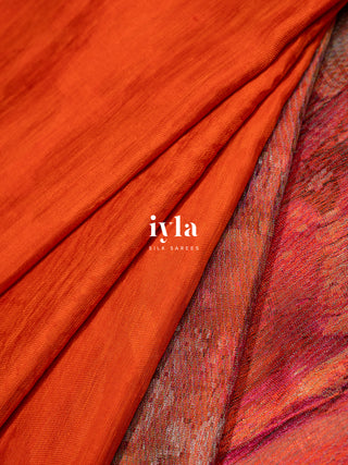 The Divine Drape of Radha Krishna in Burnt Orange