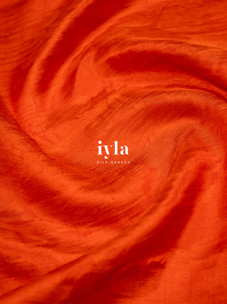 The Divine Drape of Radha Krishna in Burnt Orange
