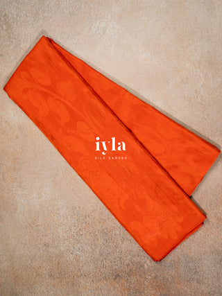 The Divine Drape of Radha Krishna in Burnt Orange