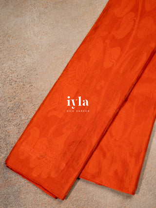 The Divine Drape of Radha Krishna in Burnt Orange