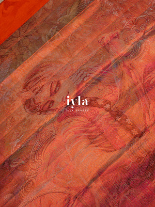 The Divine Drape of Radha Krishna in Burnt Orange