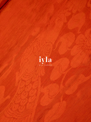 The Divine Drape of Radha Krishna in Burnt Orange