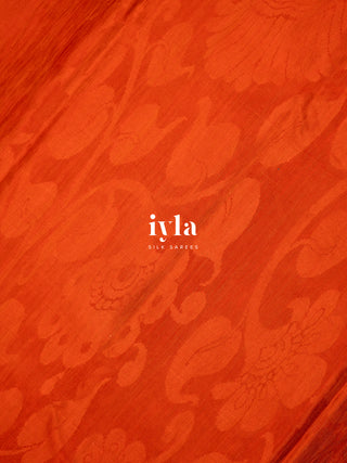 The Divine Drape of Radha Krishna in Burnt Orange