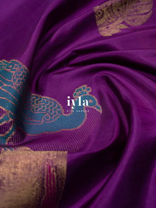 The Peacock Theory Kanjeevaram in Royal Purple in Pure Gold
