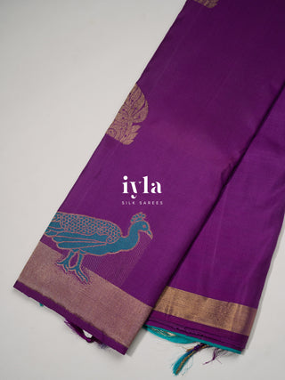 The Peacock Theory Kanjeevaram in Royal Purple in Pure Gold