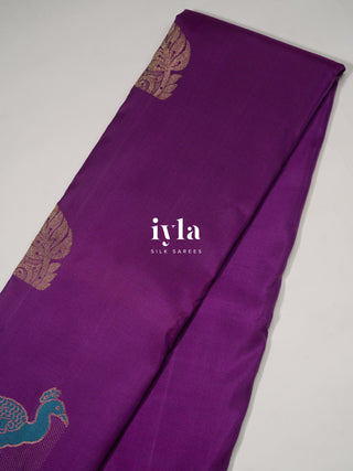 The Peacock Theory Kanjeevaram in Royal Purple in Pure Gold