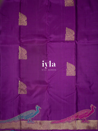 The Peacock Theory Kanjeevaram in Royal Purple in Pure Gold