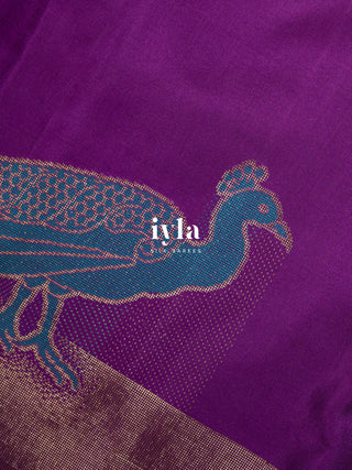 The Peacock Theory Kanjeevaram in Royal Purple in Pure Gold