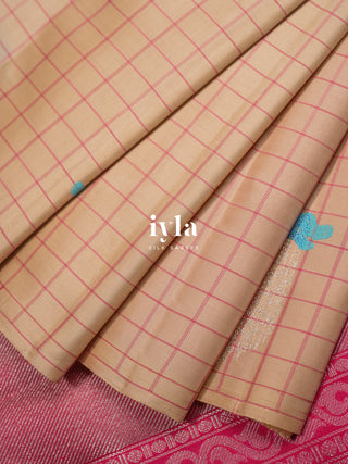 The DownPour Dream Kanjeevaram in soft Bisque