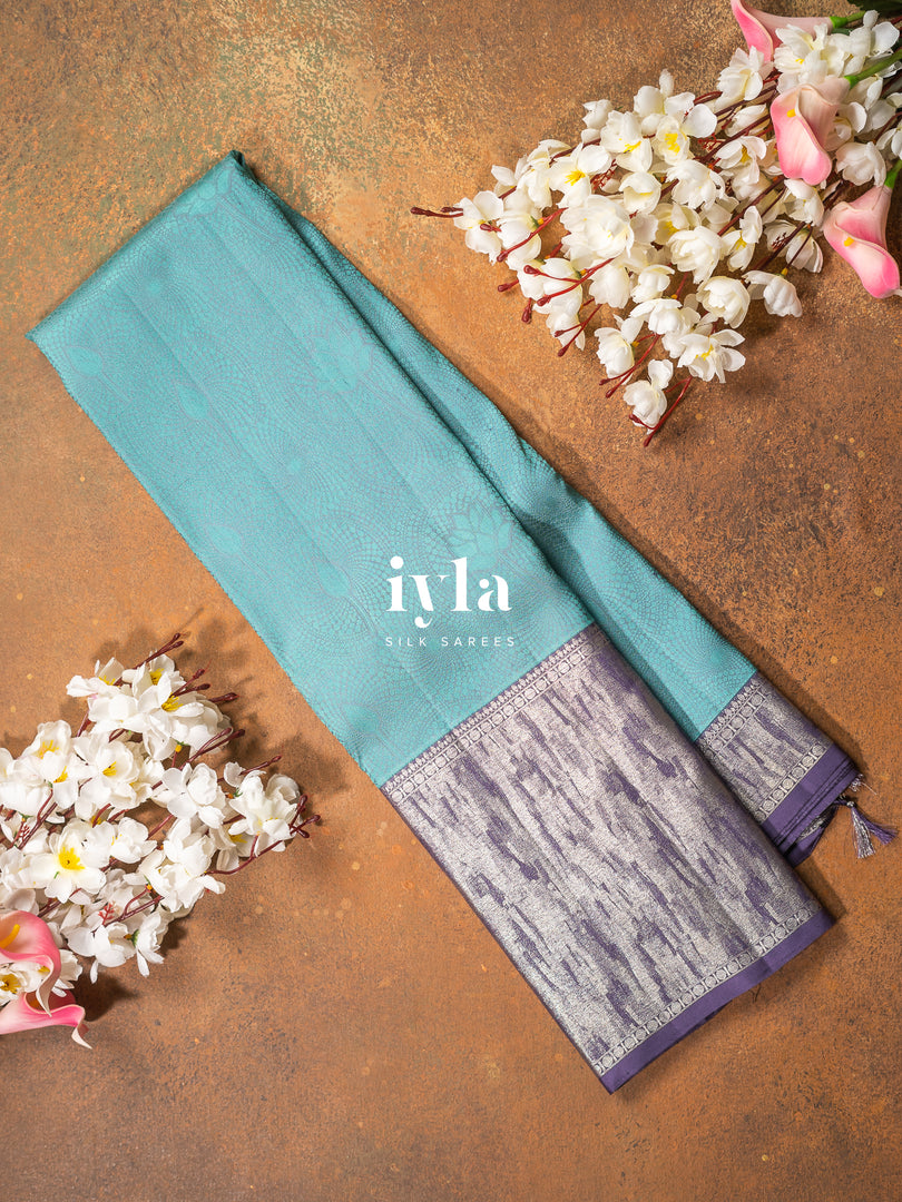 The Tiffany Blue Lotus Blooms Kanjeevaram