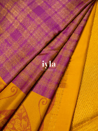 The Butterfly weave Kanjeevaram in Plum Dream