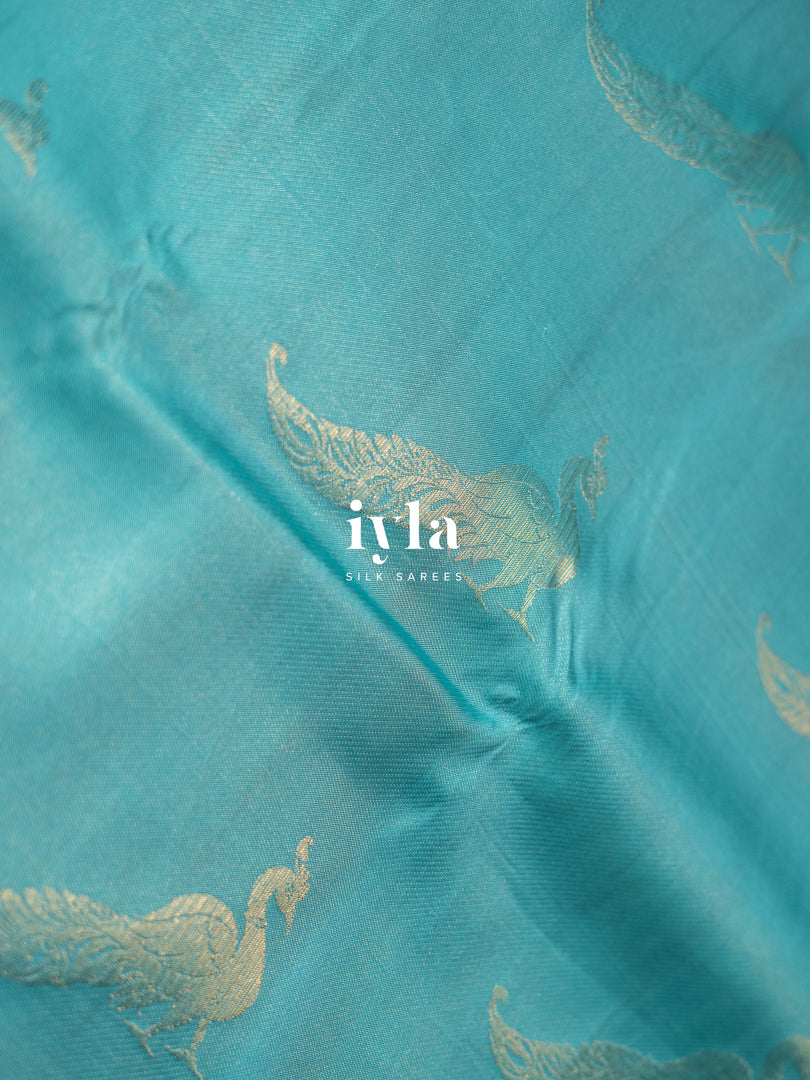The Tiffany Blue Dual Pallu Mahalakshmi - Peacock Kanjeevaram